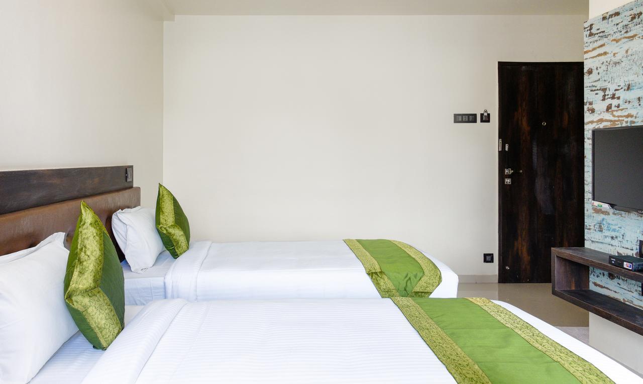 Treebo Malhaar Regency Hotel Chinchvad Exterior photo