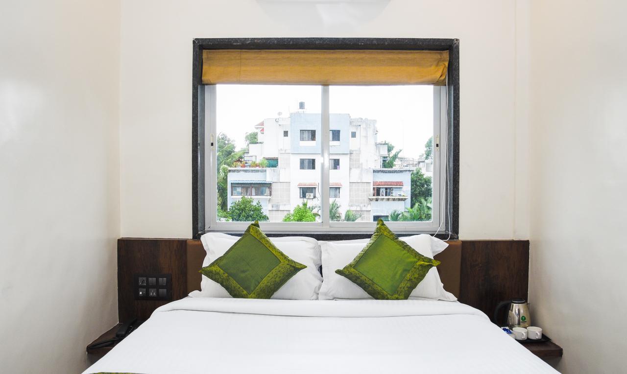 Treebo Malhaar Regency Hotel Chinchvad Exterior photo
